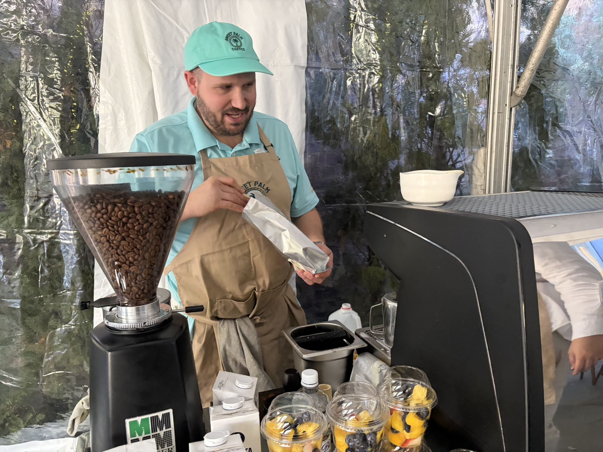 Barista at the mobile expresso cart at a live event